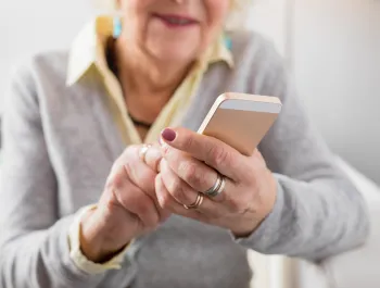A senior using a smartphone.