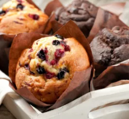 Blueberry and Chocolate muffins in a basket.