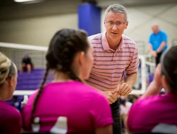 A picture of our 2023 Summer Volleyball Camp coach.